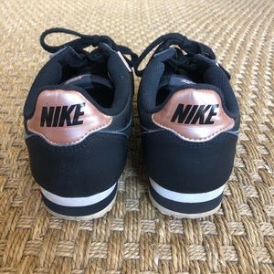 Nike rose gold & black Cortez sneakers